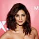 Priyanka Chopra: Asymmetric wavy lob with a side part.